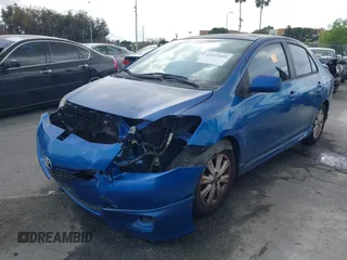 2009 Toyota Yaris with VIN JTDBT903591323255, listed as a IAAI auction lot 41933401 with 88,558 mi miles and . Bid and sale history available at DreamBid. Image 2.