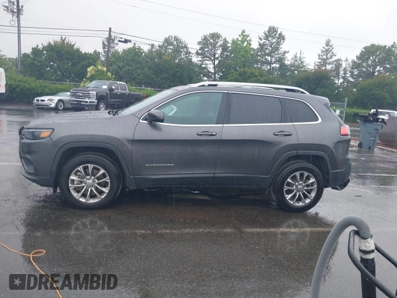 2019 Jeep Cherokee Latitude Plus with VIN 1C4PJMLB7KD195591, listed as a IAAI auction lot 42433607 with 58,370 mi miles and . Bid and sale history available at DreamBid. Image 14.