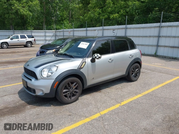 2012 MINI Countryman S with VIN WMWZC5C54CWM13119, listed as a IAAI auction lot 42467904 with 115,531 mi miles and . Bid and sale history available at DreamBid. Image 2.