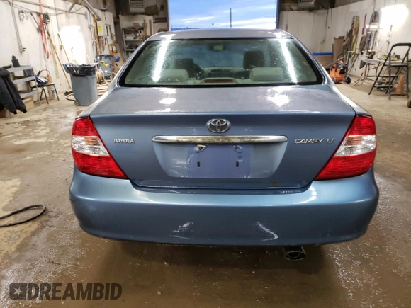 2004 Toyota Camry LE with VIN 4T1BE32K64U812388, listed as a Copart auction lot 82777563 with 209,219 mi miles and Clean Title. Bid and sale history available at carsss.com. Image 6.