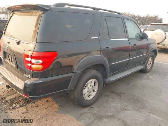 2002 Toyota Sequoia Limited with VIN 5TDZT38A32S065230, listed as a IAAI auction lot 41290794 with 306,444 mi miles. Bid and sale history available at carsss.com. Image 4.