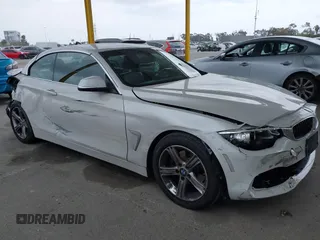 2015 BMW 4 Series 428i z VIN WBA3V7C5XFP772663, wystawiony jako IAAI lot #42101012 z przebiegiem 75 901 mil mil oraz . Historia ofert i sprzedaży dostępna na DreamBid. Obrazek 1.