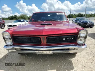 1965 Pontiac GTO z VIN 233275P156710, wystawiony jako Copart lot #74094594 z przebiegiem 22 008 mil mil oraz Szkoda całkowita • Salvage title. Historia ofert i sprzedaży dostępna na DreamBid. Obrazek 5.