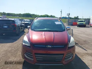 2016 Ford Escape SE z VIN 1FMCU0G79GUB36498, wystawiony jako IAAI lot #42216144 z przebiegiem 179 230 mil mil oraz . Historia ofert i sprzedaży dostępna na DreamBid. Obrazek 13.