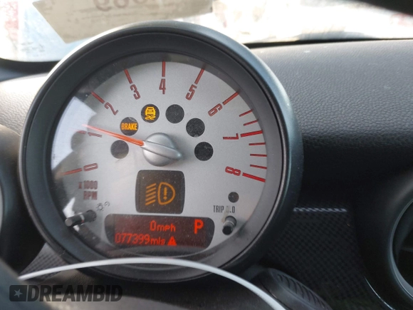 2013 MINI Roadster S z VIN WMWSY3C55DT594628, wystawiony jako IAAI lot #41316950 z przebiegiem 77 399 mil mil oraz . Historia ofert i sprzedaży dostępna na DreamBid. Obrazek 7.