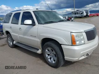 2004 Cadillac Escalade z VIN 1GYEK63N74R291571, wystawiony jako IAAI lot #42298658 z przebiegiem 204 129 mil mil oraz . Historia ofert i sprzedaży dostępna na DreamBid. Obrazek 1.
