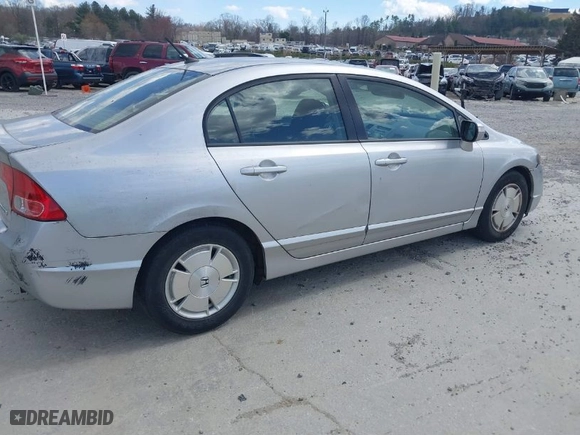2007 Honda Civic Hybrid with VIN JHMFA36297S019581, listed as a IAAI auction lot 41879187 with 87,297 mi miles. Bid and sale history available at carsss.com. Image 4.