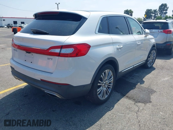 2017 Lincoln MKX Reserve z VIN 2LMPJ6LP2HBL49047, wystawiony jako IAAI lot #42151969 z przebiegiem 65 719 mil mil oraz . Historia ofert i sprzedaży dostępna na DreamBid. Obrazek 4.