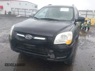 2009 Kia Sportage LX with VIN KNDJE723497612745, listed as a IAAI auction lot 41974301 with 141,110 mi miles and . Bid and sale history available at carsss.com. Image 6.