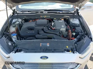 2016 Ford Fusion Energi SE Luxury with VIN 3FA6P0PU8GR273122, listed as a IAAI auction lot 42062083 with 166,318 mi miles. Bid and sale history available at carsss.com. Image 10.