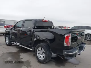 2015 GMC Canyon 2WD SLE with VIN 1GTG5BE30F1139093, listed as a IAAI auction lot 41596657 with 143,834 mi miles. Bid and sale history available at carsss.com. Image 3.