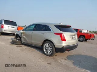 2017 Cadillac XT5 Premium Luxury FWD z VIN 1GYKNCRSXHZ164468, wystawiony jako IAAI lot #40314503 z przebiegiem 94 008 mil mil oraz . Historia ofert i sprzedaży dostępna na DreamBid. Obrazek 3.