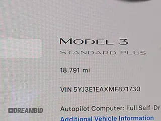 2021 Tesla Model 3 Standard Range Plus z VIN 5YJ3E1EAXMF871730, wystawiony jako IAAI lot #41794274 z przebiegiem 18 791 mil mil oraz . Historia ofert i sprzedaży dostępna na DreamBid. Obrazek 15.