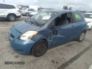 2010 Toyota Yaris with VIN JTDJT4K39A5295243, listed as a IAAI auction lot 41784428 with 92,354 mi miles. Bid and sale history available at carsss.com. Image 2.