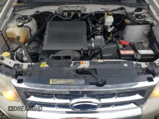 2010 Ford Escape Limited with VIN 1FMCU0EGXAKA03092, listed as a Copart auction lot 61094785 with 114,884 mi miles and Salvage title. Bid and sale history available at DreamBid. Image 12.
