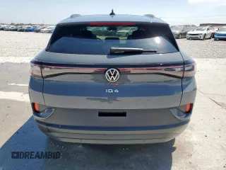2023 Volkswagen ID.4 Pro z VIN 1V2VMPE88PC022658, wystawiony jako Copart lot #52888005 z przebiegiem 26 756 mil mil oraz Szkody całkowita. Historia ofert i sprzedaży dostępna na DreamBid. Obrazek 6.