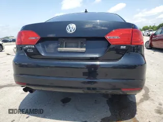 2014 Volkswagen Jetta SE z VIN 3VWD07AJ4EM445862, wystawiony jako Copart lot #61411995 z przebiegiem Nie podano mil oraz Czysty tytuł • Clean title. Historia ofert i sprzedaży dostępna na DreamBid. Obrazek 6.