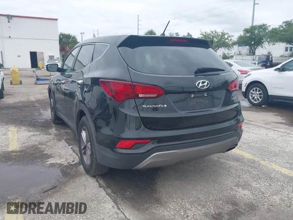 2018 Hyundai Santa Fe 2.4L with VIN 5XYZT3LB5JG539917, listed as a IAAI auction lot 41975300 with 214,562 mi miles and . Bid and sale history available at DreamBid. Image 3.