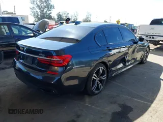 2019 BMW 7 Series 740i with VIN WBA7E2C53KB218375, listed as a IAAI auction lot 42008827 with 61,337 mi miles and . Bid and sale history available at DreamBid. Image 4.