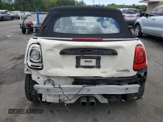 2017 MINI Convertible Cooper S с VIN WMWWG9C5XH3C80635, выставлен на аукционе Copart как лот 56167715 с пробегом 79 485 миль миль и Списание • Salvage title. История ставок и продаж доступна на DreamBid. Изображение 6.