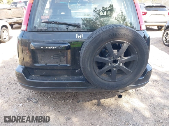 1998 Honda CR-V LX z VIN JHLRD1740WC076533, wystawiony jako IAAI lot #42046673 z przebiegiem 201 946 mil mil oraz . Historia ofert i sprzedaży dostępna na DreamBid. Obrazek 14.