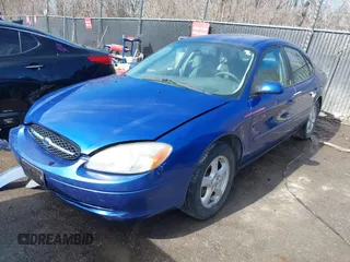 2003 Ford Taurus SE Standard with VIN 1FAFP53233G208763, listed as a IAAI auction lot 41661923 with 127,830 mi miles. Bid and sale history available at carsss.com. Image 19.