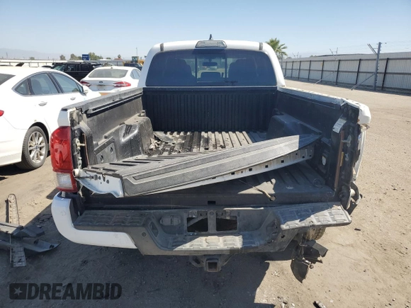 2017 Toyota Tacoma SR5 with VIN 3TMDZ5BN2HM027836, listed as a Copart auction lot 57299415 with 124,255 mi miles and Salvage title. Bid and sale history available at DreamBid. Image 6.