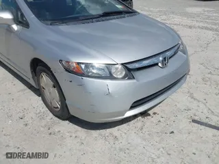 2007 Honda Civic Hybrid with VIN JHMFA36297S019581, listed as a IAAI auction lot 41879187 with 87,297 mi miles. Bid and sale history available at carsss.com. Image 6.