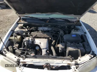 1997 Toyota Camry LE z VIN JT2BG22K4V0077954, wystawiony jako Copart lot #57682355 z przebiegiem 254 596 mil mil oraz Szkoda całkowita • Salvage title. Historia ofert i sprzedaży dostępna na DreamBid. Obrazek 11.