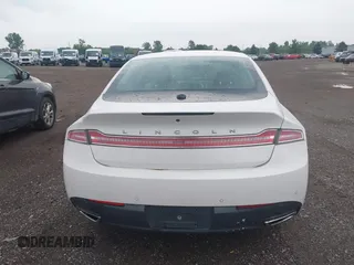 2016 Lincoln MKZ with VIN 3LN6L2JK9GR609137, listed as a IAAI auction lot 42679691 with 125,180 mi miles and . Bid and sale history available at DreamBid. Image 16.