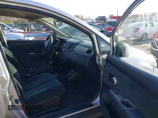 2011 Nissan Versa 1.8 S with VIN 3N1BC1AP5BL432979, listed as a IAAI auction lot 41932890 with 150,041 mi miles. Bid and sale history available at carsss.com. Image 5.