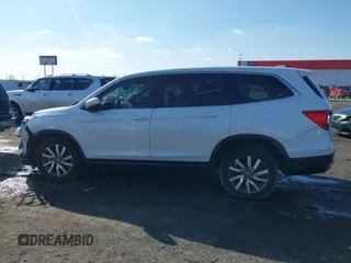 2021 Honda Pilot EX-L with VIN 5FNYF5H57MB037861, listed as a IAAI auction lot 41566924 with 42,867 mi miles. Bid and sale history available at carsss.com. Image 14.