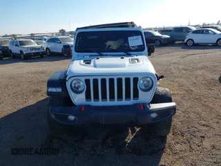 2019 Jeep Wrangler Unlimited Rubicon with VIN 1C4HJXFN7KW505383, listed as a IAAI auction lot 41220907 with 53,578 mi miles and . Bid and sale history available at DreamBid. Image 12.