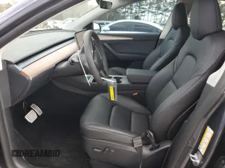 2023 Tesla Model Y Performance with VIN 7SAYGDEF4PF920859, listed as a Copart auction lot 89136705 with 8,148 mi miles and Salvage Title. Bid and sale history available at DreamBid. Image 7.
