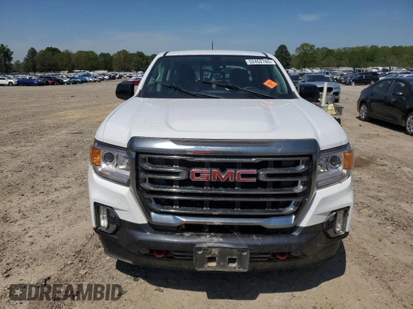 2021 GMC Canyon 4WD AT4 z VIN 1GTG6FEN5M1118081, wystawiony jako Copart lot #52452785 z przebiegiem 92 960 mil mil oraz Szkody całkowita. Historia ofert i sprzedaży dostępna na DreamBid. Obrazek 5.