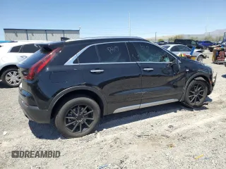 2021 Cadillac XT4 FWD Premium Luxury с VIN 1GYFZCR4XMF004996, выставлен на аукционе Copart как лот 61270355 с пробегом Не указан миль и Списание • Salvage title. История ставок и продаж доступна на DreamBid. Изображение 3.