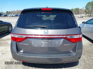 2012 Honda Odyssey Touring with VIN 5FNRL5H91CB057344, listed as a IAAI auction lot 41835272 with 158,854 mi miles. Bid and sale history available at carsss.com. Image 16.
