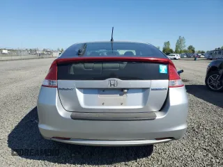 2010 Honda Insight EX z VIN JHMZE2H74AS034758, wystawiony jako Copart lot #52905445 z przebiegiem 154 148 mil mil oraz Szkoda całkowita • Salvage title. Historia ofert i sprzedaży dostępna na DreamBid. Obrazek 6.