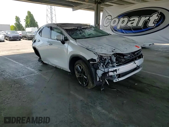 2025 Lexus NX 450h+ Luxury z VIN JTJHKCFZ2S2044283, wystawiony jako Copart lot #59584865 z przebiegiem 3 562 mil mil oraz Szkoda całkowita • Salvage title. Historia ofert i sprzedaży dostępna na DreamBid. Obrazek 13.