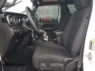 2023 Jeep Wrangler Sport S with VIN 1C4HJXDN3PW522353, listed as a Copart auction lot 86645234 with 17,562 mi miles and Salvage Title. Bid and sale history available at DreamBid. Image 7.