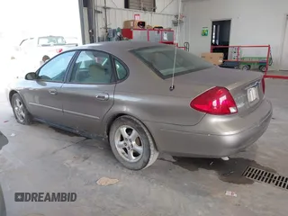 2002 Ford Taurus SES Standard with VIN 1FAFP55U32A171004, listed as a IAAI auction lot 41782261 with 105,967 mi miles. Bid and sale history available at carsss.com. Image 3.