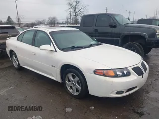2005 Pontiac Bonneville SLE z VIN 1G2HY52K45U160801, wystawiony jako IAAI lot #41360401 z przebiegiem 167 147 mil mil oraz . Historia ofert i sprzedaży dostępna na DreamBid. Obrazek 1.
