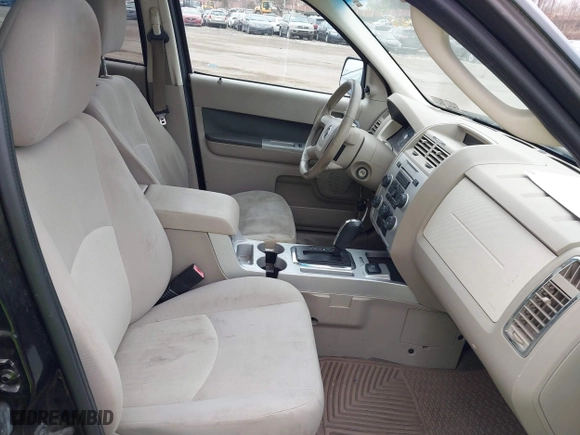 2009 Mercury Mariner Hybrid with VIN 4M2CU29359KJ09642, listed as a IAAI auction lot 41734762 with 233,989 mi miles. Bid and sale history available at carsss.com. Image 5.