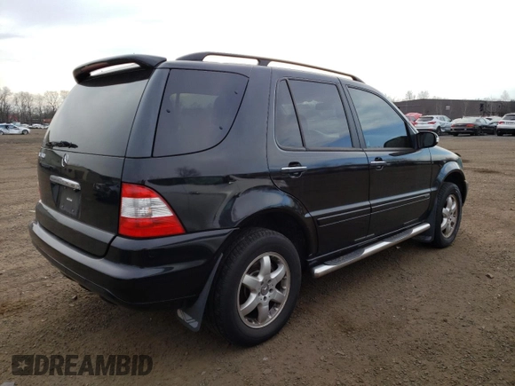 2003 Mercedes-Benz M-Class with VIN 4JGAB75E63A448619, listed as a Copart auction lot 88395555 with 93,849 mi miles and Salvage Title. Bid and sale history available at carsss.com. Image 3.