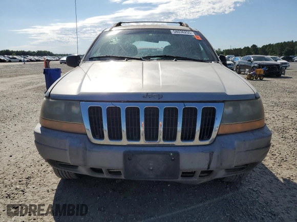 2000 Jeep Grand Cherokee Laredo with VIN 1J4G248S7YC321298, listed as a Copart auction lot 58036255 with 292,779 mi miles and Salvage title. Bid and sale history available at DreamBid. Image 5.