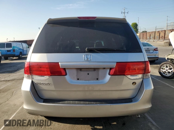 2009 Honda Odyssey EX-L with VIN 5FNRL38619B044063, listed as a Copart auction lot 52372505 with 204,658 mi miles and Salvage Title. Bid and sale history available at DreamBid. Image 6.