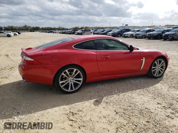 2007 Jaguar XK with VIN SAJWA43C379B19952, listed as a Copart auction lot 85141054 with 49,599 mi miles and Salvage Title. Bid and sale history available at carsss.com. Image 3.
