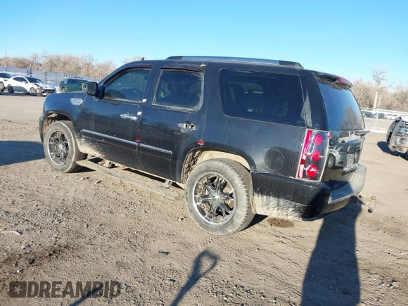 2013 GMC Yukon Denali with VIN 1GKS2EEF7DR310276, listed as a IAAI auction lot 41432983 with 243,119 mi miles. Bid and sale history available at carsss.com. Image 3.