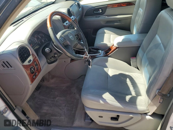 2006 GMC Envoy Denali with VIN 1GKET63M762190296, listed as a Copart auction lot 46691595 with 128,985 mi miles and Salvage Title. Bid and sale history available at carsss.com. Image 7.