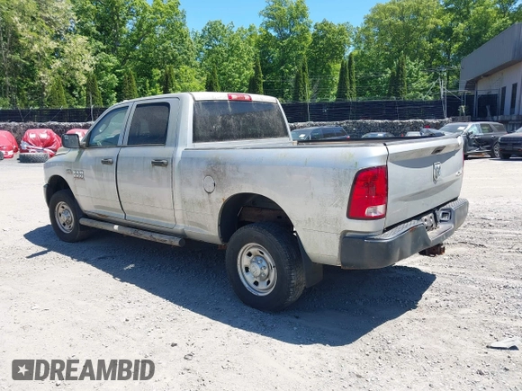 2014 Ram 2500 Tradesman z VIN 3C6TR5CT7EG186099, wystawiony jako IAAI lot #42317585 z przebiegiem 309 687 mil mil oraz . Historia ofert i sprzedaży dostępna na DreamBid. Obrazek 3.